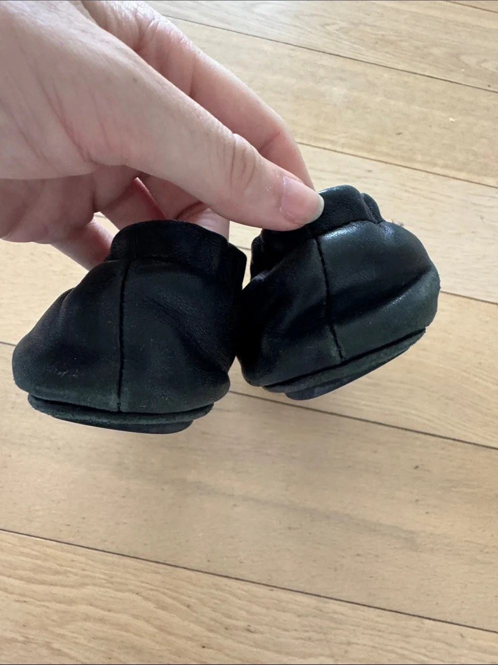 Tory Burch Black Ballet Flats with Gold Logo Medallions